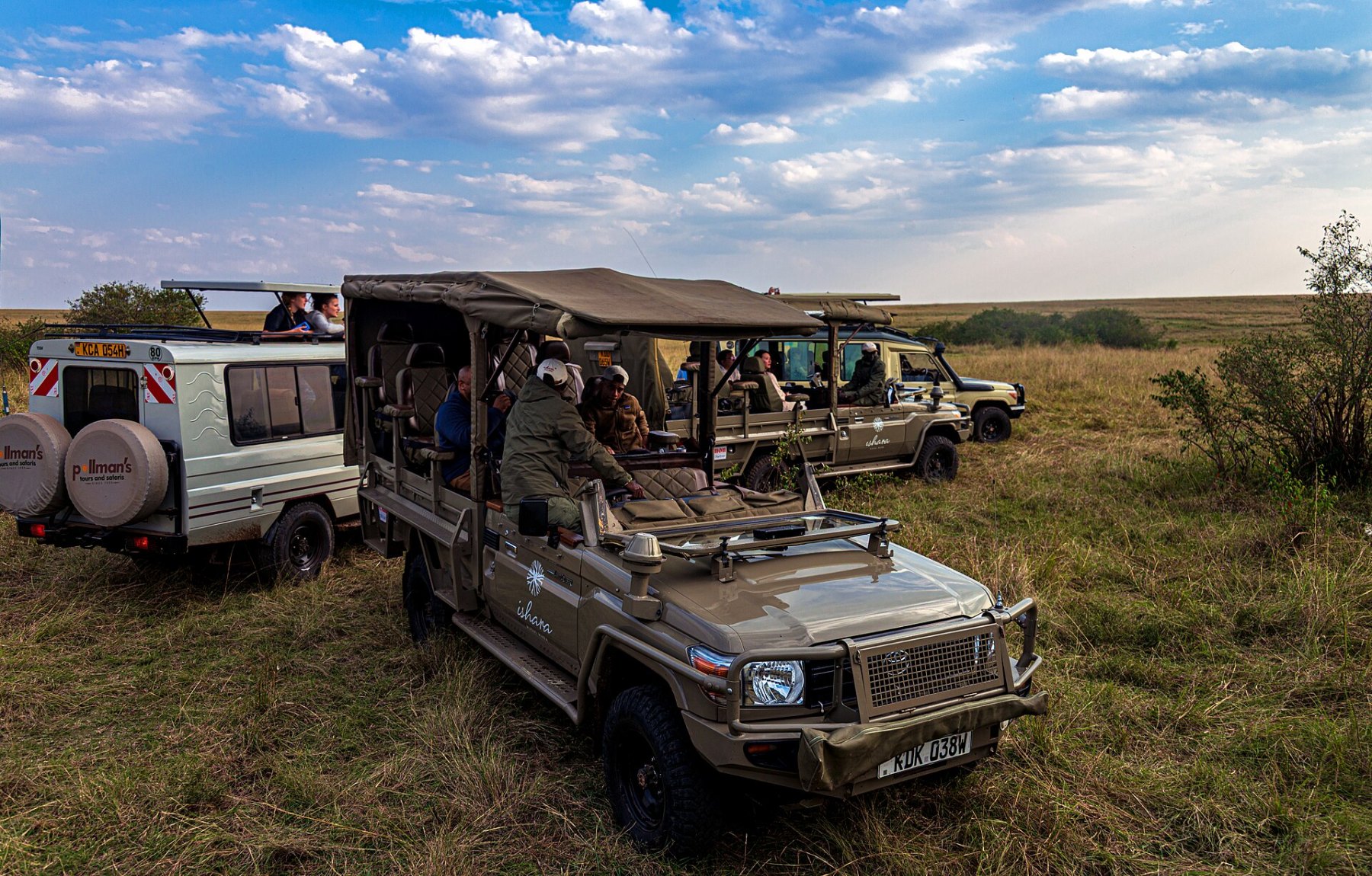 Safari vehicles in the Masai Mara